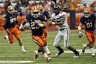 Syracuse's Prince-Tyson Gulley (23) carries the ball against Colgate  during the second half of an NCAA college football game Saturday, Sept. 25, 2010 at the Carrier Dome in Syracause, N.Y.  (AP Photo/Heather Ainsworth)